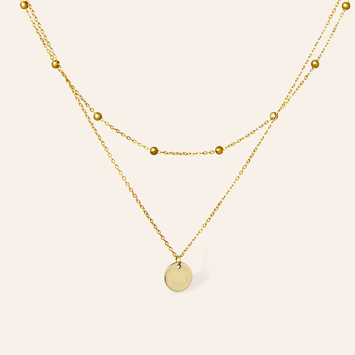 Gouden gelaagde ketting met munt hanger en bolletjes ketting – Bloem van Amberz, waterproof en hypoallergeen.