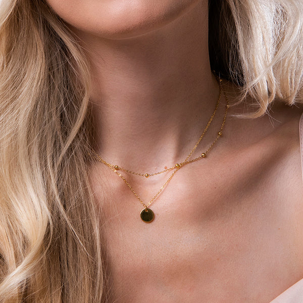 Gouden gelaagde ketting met munt hanger en bolletjes ketting – Bloem van Amberz, waterproof en hypoallergeen.
