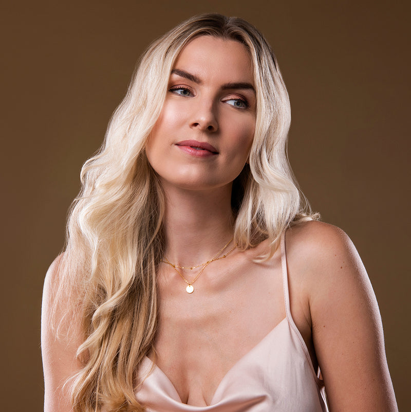 Gouden gelaagde ketting met munt hanger en bolletjes ketting – Bloem van Amberz, waterproof en hypoallergeen.