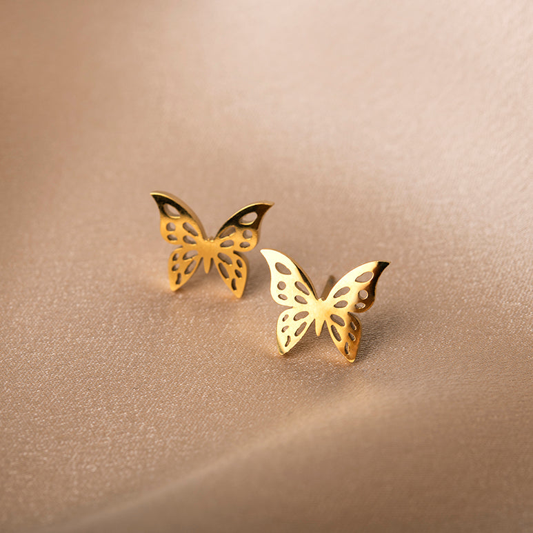Gouden vlinder kinderoorbellen – Butterbelle van Amberz