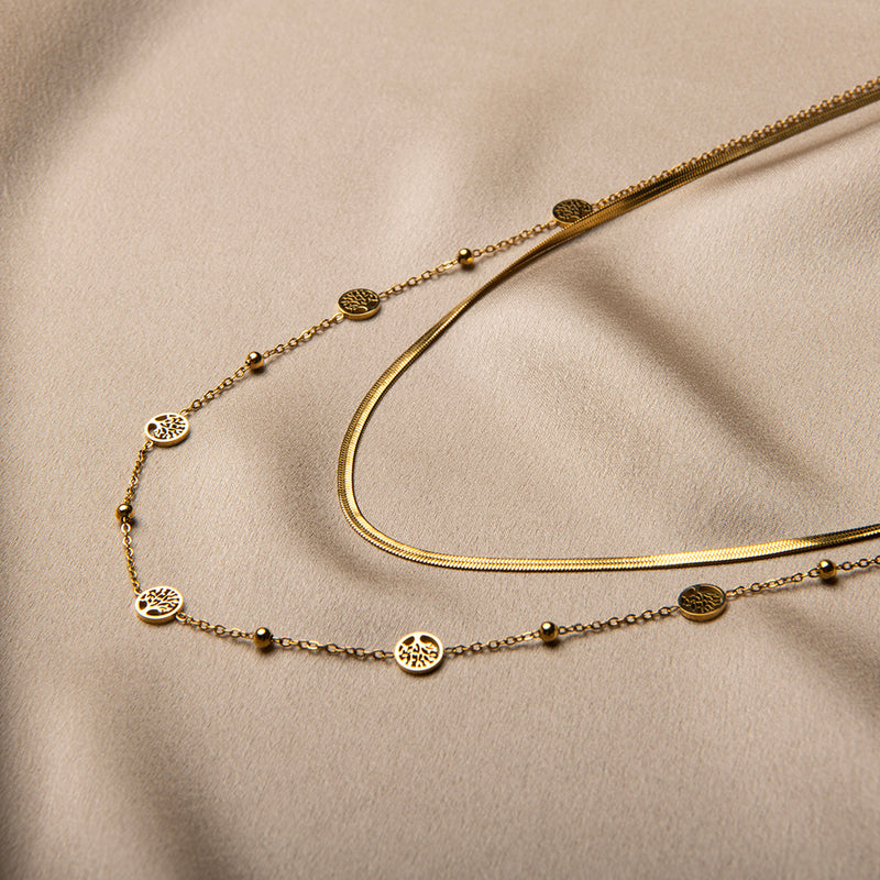 Gouden dubbele ketting met boom des levens symbool en snake chain – Estrel van Amberz.