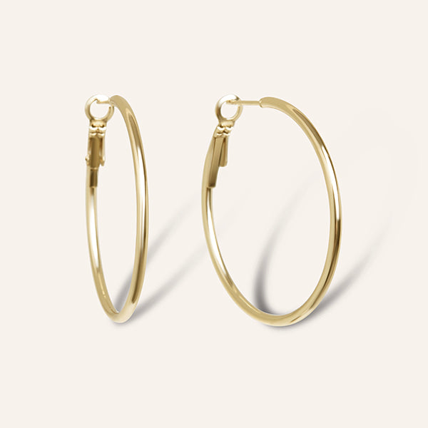 amberz gouden oorringen – minimalistische hoops van verguld roestvrij staal, tijdloos en waterproof