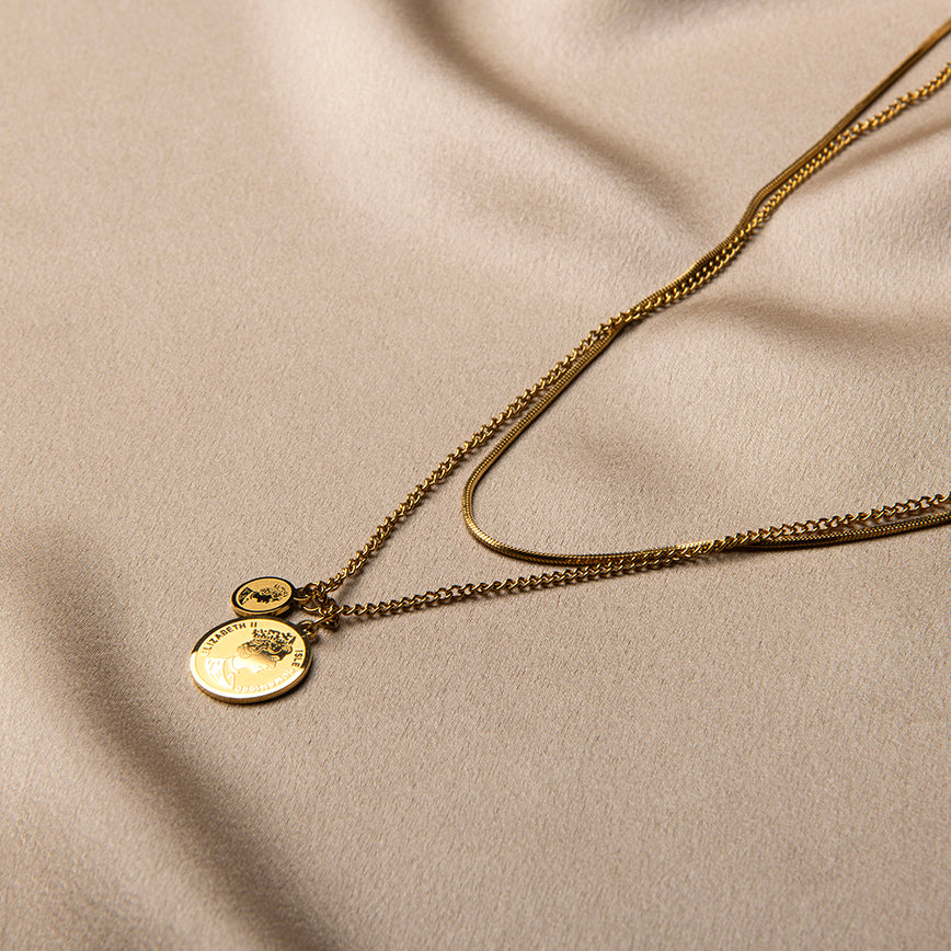 Gouden ketting met muntjes in laagjes – Palawan van Amberz.
