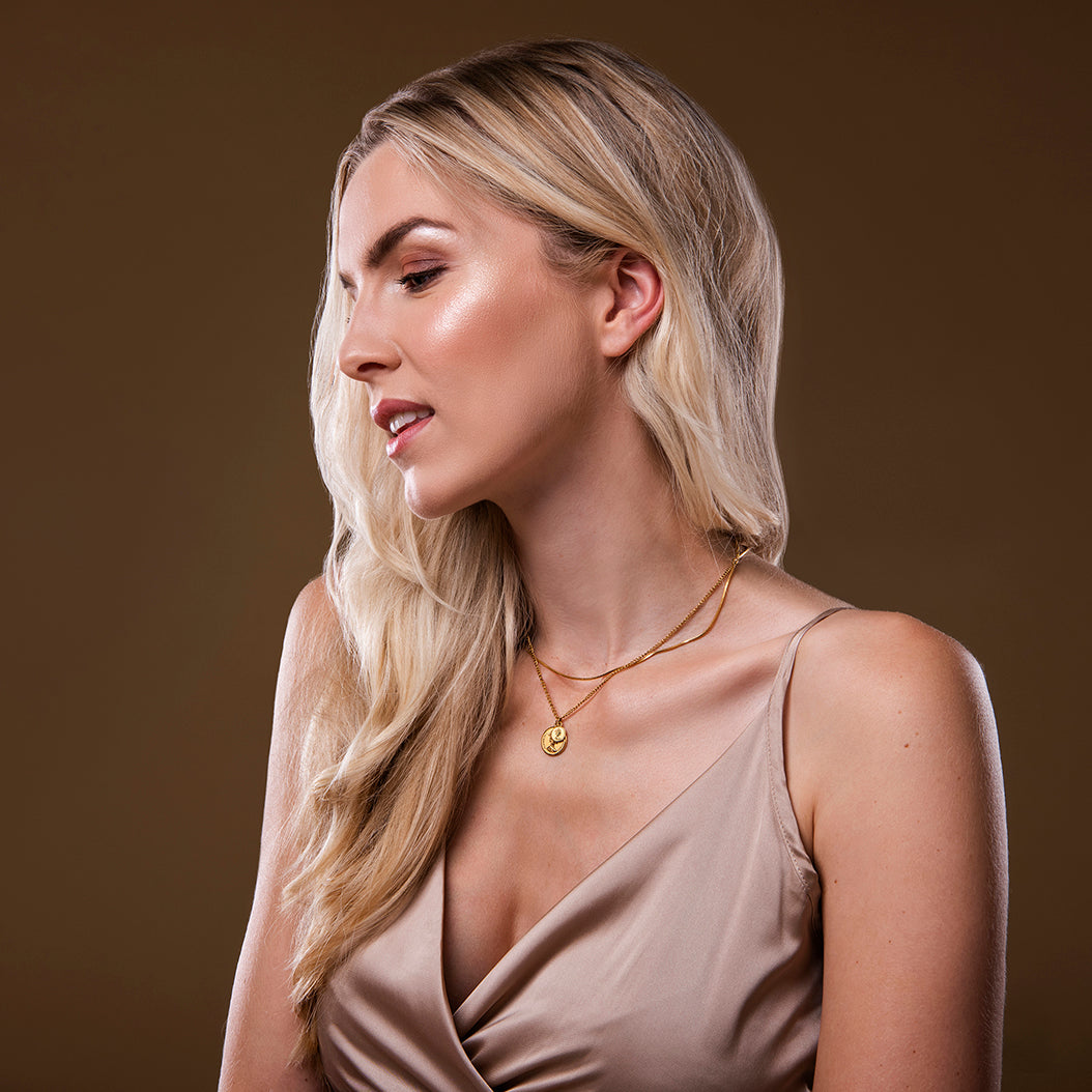 Gouden ketting met muntjes in laagjes – Palawan van Amberz.
