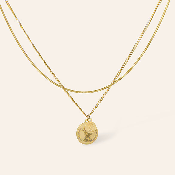 Gouden ketting met muntjes in laagjes – Palawan van Amberz.
