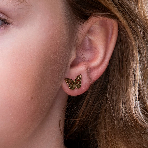 Gouden vlinder kinderoorbellen – Butterbelle van Amberz