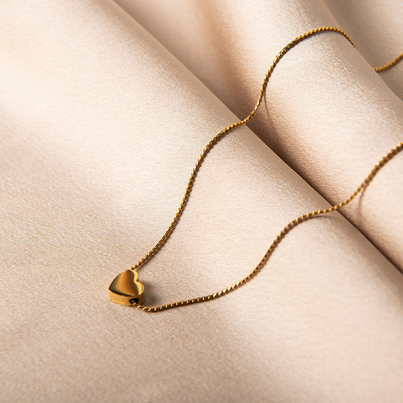 Gouden ketting met liefde hart hanger – Tiny Heart van Amberz.