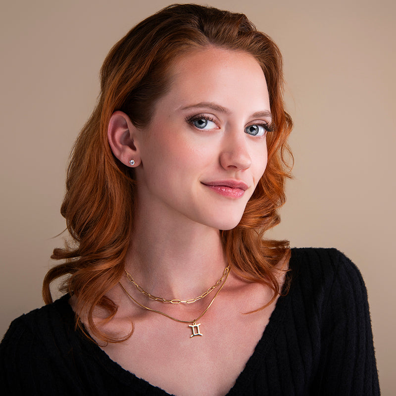 gouden dubbele ketting met sterrenbeeld hanger tweelingen – zodiac ketting met paperclip en slangenketting