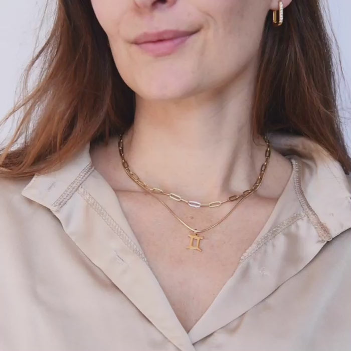 gouden dubbele ketting met sterrenbeeld hanger tweelingen – zodiac ketting met paperclip en slangenketting