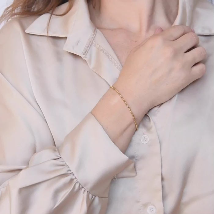 fijne gouden schakelarmband met verstelbare sluiting – minimalistisch en waterproof