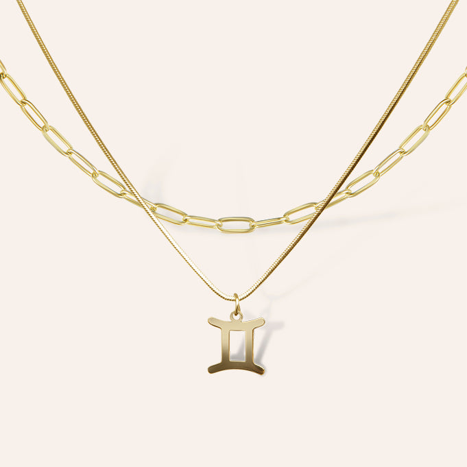 gouden dubbele ketting met sterrenbeeld hanger tweelingen – zodiac ketting met paperclip en slangenketting